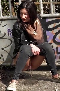 City Peeing For Seductive Black Haired Chick