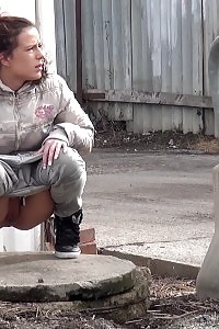 Heartwarming Brunette Peeing On An Industrial Estate