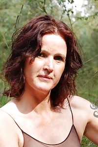 Magnetic Ginger In Her Mature Years Posing Off Her Underwears In A Public And Jerking Off