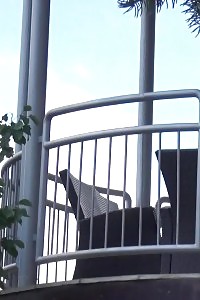 Magnificent Ginger Pisses Over Her Balcony