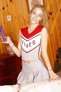 Elegant Blonde Cheerleader Jerking Off In Her Bed Room And Cramming Her Clit With A Dildo