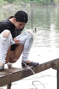 Interesting Hottie Pisses Twice In This Public Scene