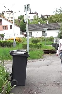 Black-haired In Glasses Pissing Onto Her Trainers