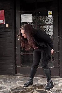 Dark Haired Pornstar Empties Her Bladder Outside