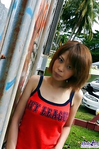 Perverted Asian Cocotte Posing In Her Red Undie Showing Her Gorgeous Tits